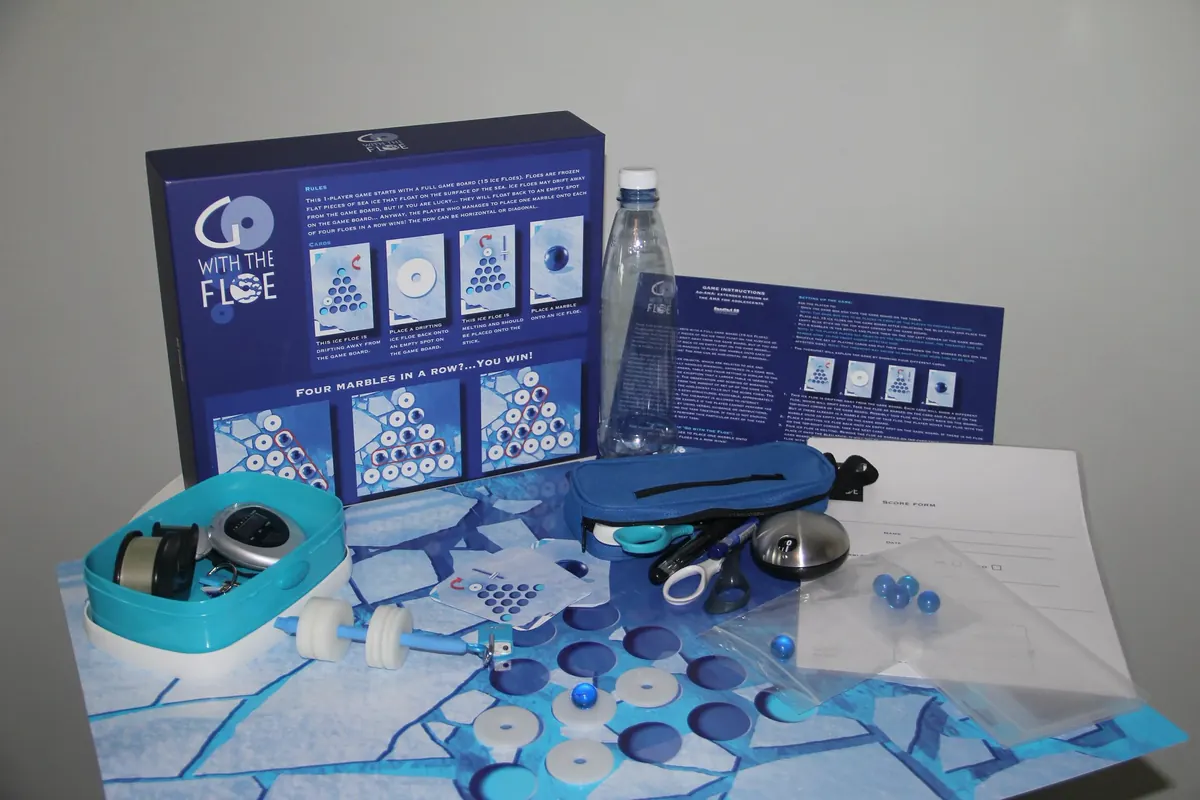 The Go with the Floe board game laid out with its playing pieces and instructions.